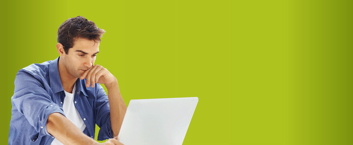 designer writing custom software with laptop